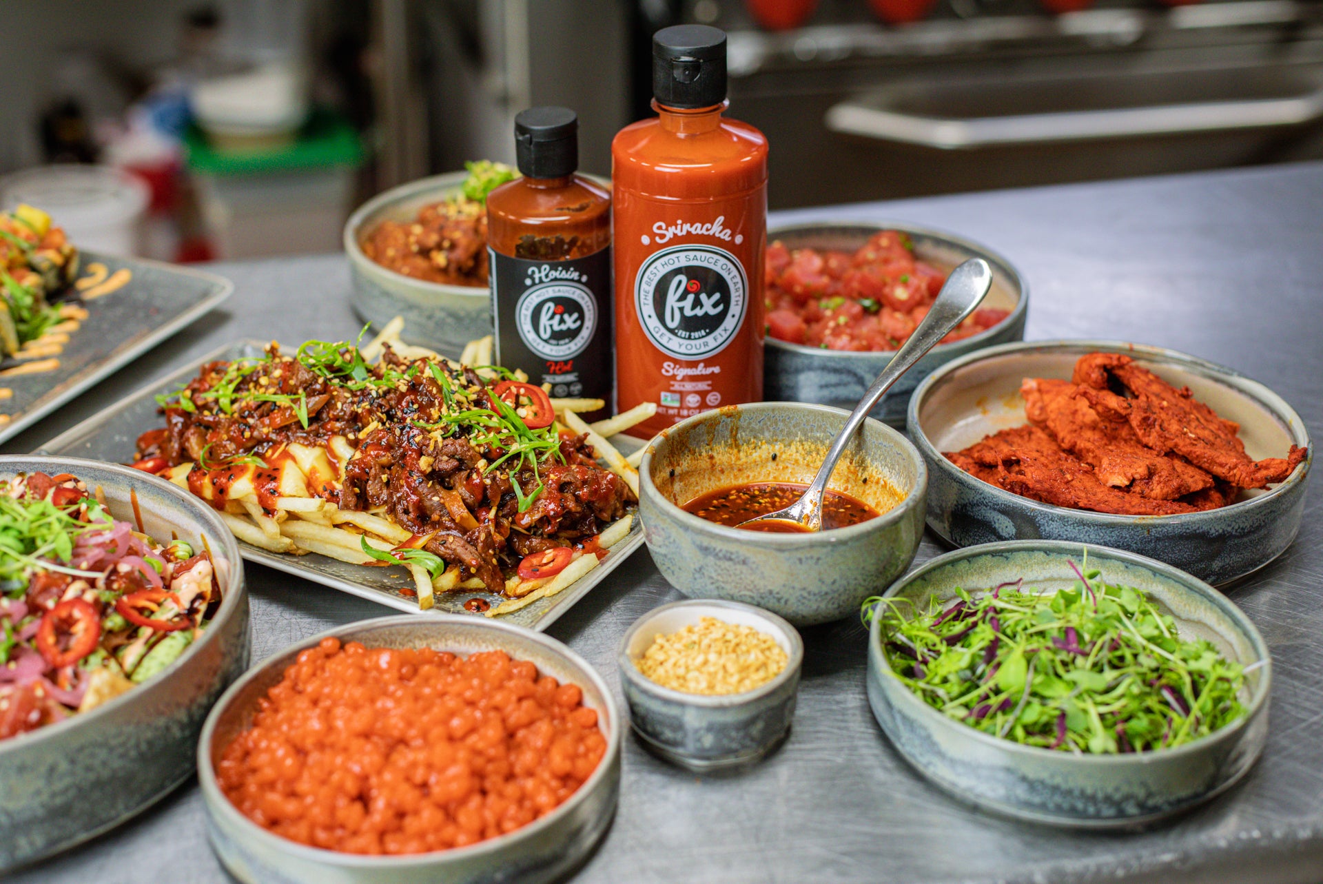 A photo of Fix Hot Sauce products using in a local restaurant, Bar Dojo.